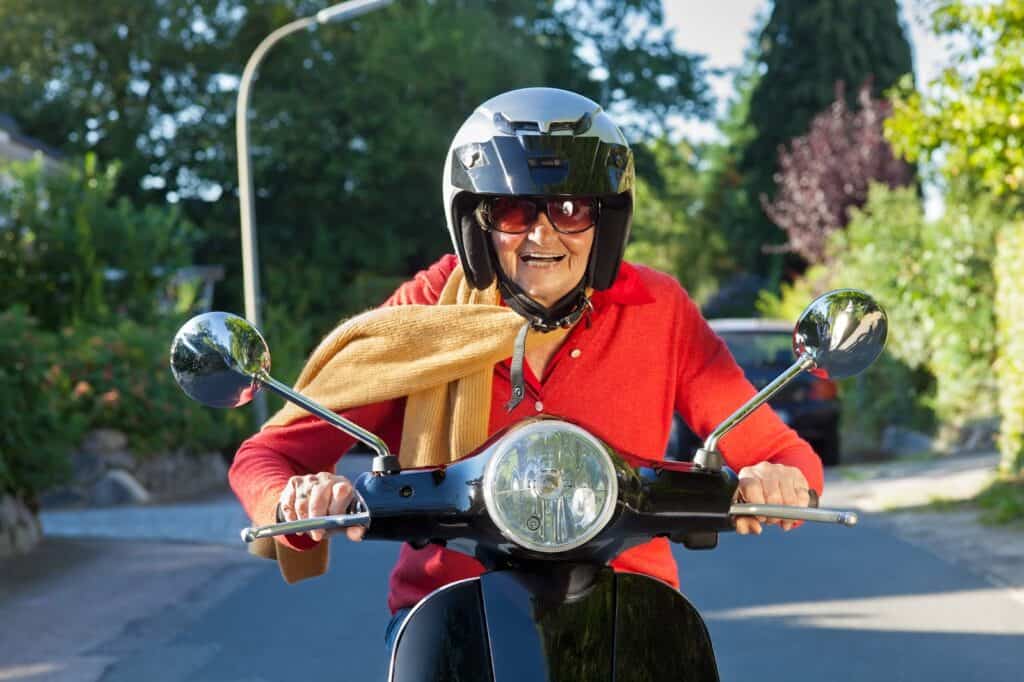 senior-lady-riding-scooter