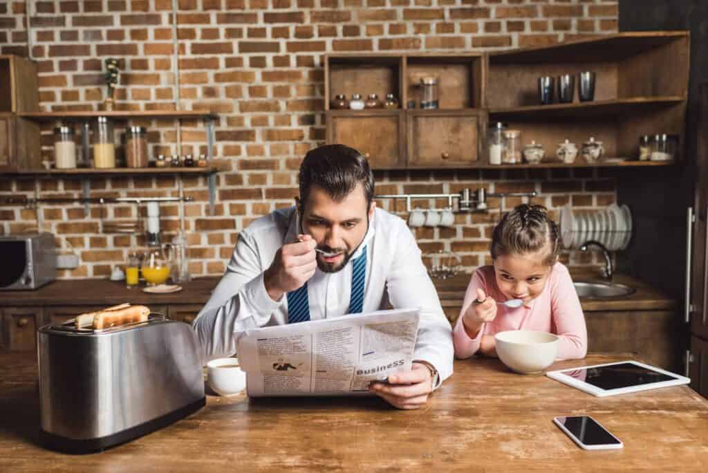 father-and-daughter-eating-breakfast-together