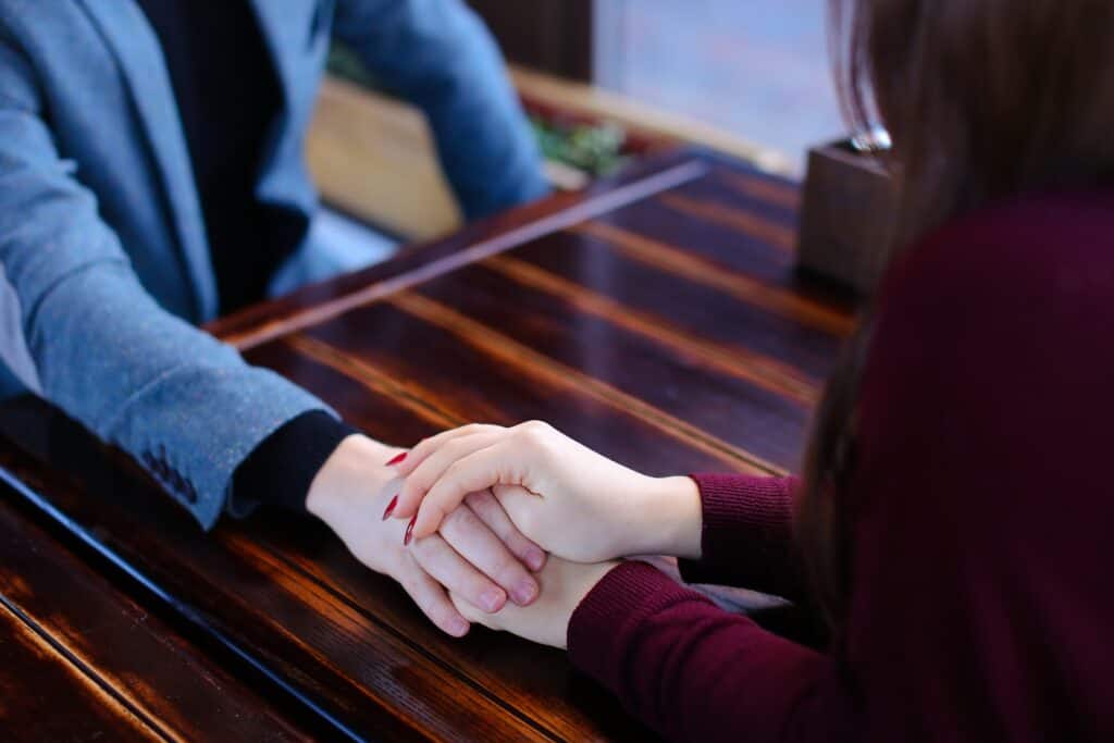 girl-holding-guy-hand