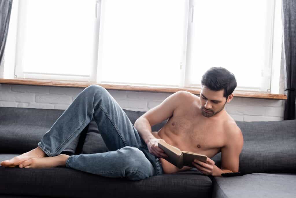 shirtless-man-reading
