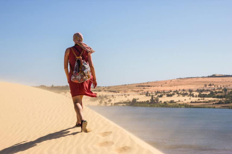 woman-walking-alone-in-desert