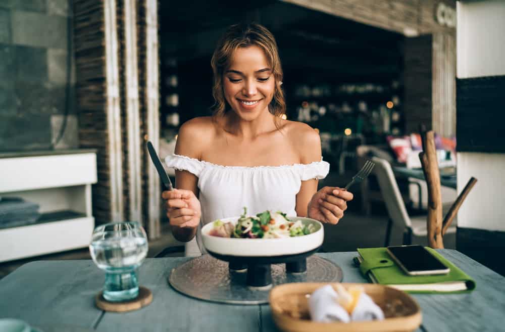 woman-enjoying-meal-alone