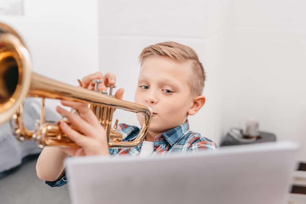 boy-practicing-trumpet