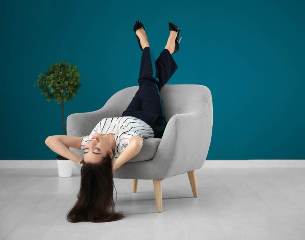 woman-sitting-comfortably-in-chair