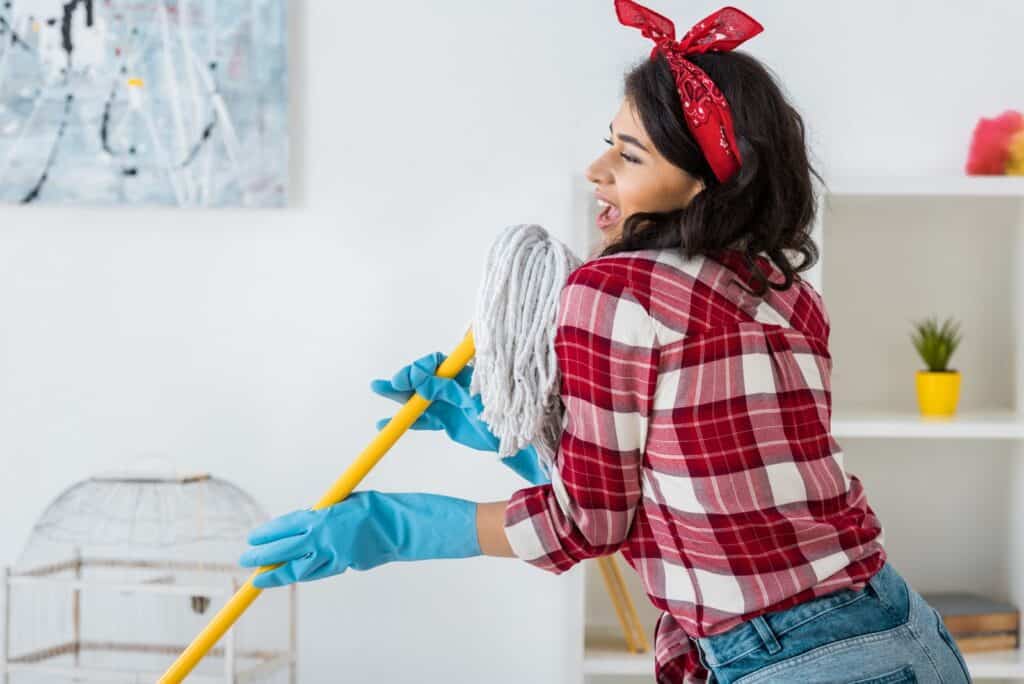 woman-singing-with-mop