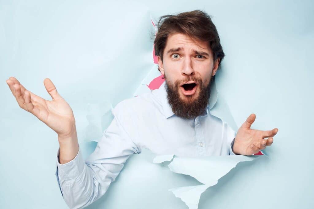 bearded-man-in-shirt-office-career-work-emotions-close-up