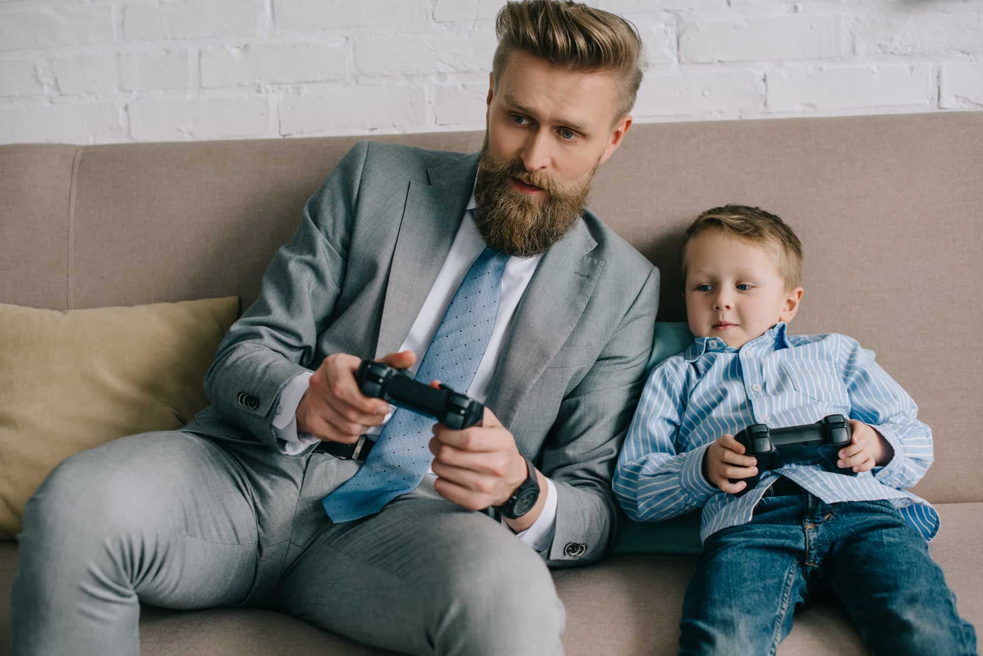 work-life-balance-concept-of-business-man-playing-video-games-with-son