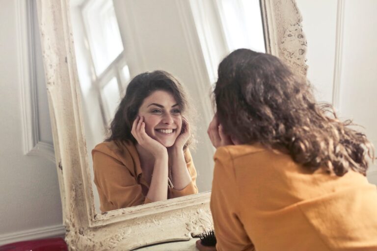 girl looking in mirror