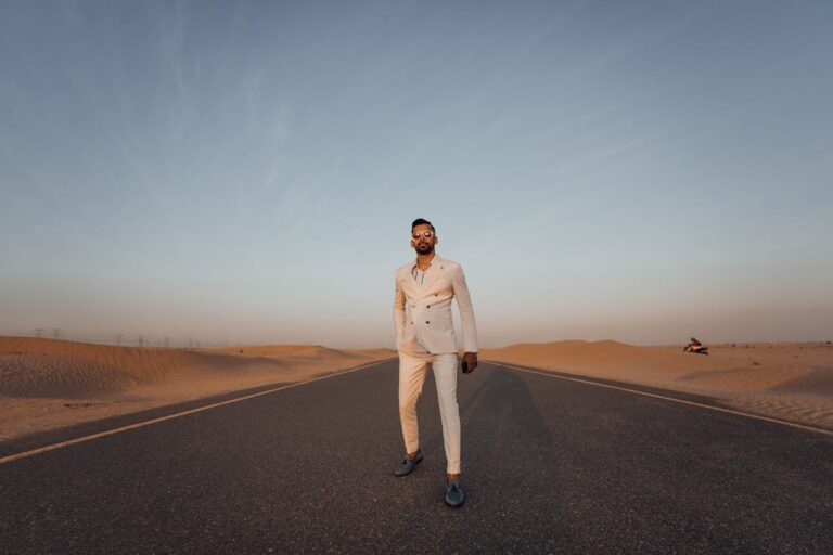 man in white suit